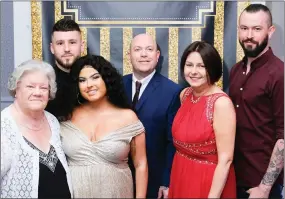  ??  ?? Jade (third from left) at the glitter ball held in her honour with her family and partner: (from left) Joan McCann, Bren Anderson, Anthony, Kim and Eoin McCann.