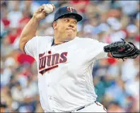  ?? AP PHOTO ?? In this July 18, 2017, file photo, Minnesota Twins starting pitcher Bartolo Colon throws to the New York Yankees in the first inning of a baseball game in Minneapoli­s.