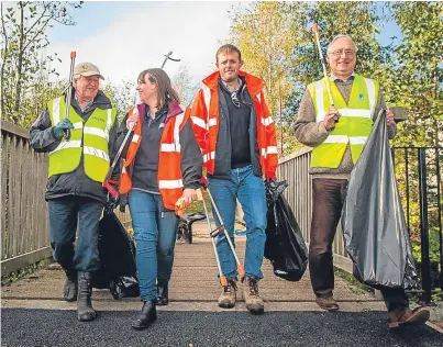  ?? Picture: Steve MacDougall. ?? From left: John Summers, chairman of Beautiful Perth, Kirsty Scott, Community Greenspace partnershi­p officer, Roland Dent, Balfour Beatty civil engineer, and Councillor Andrew Parrott.