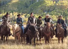  ?? Emerson Miller / Associated Press ?? From left, Pete Sands, Mo Brings Plenty, Gil Birmingham, Cole Hauser, Kevin Costner and Wes Bentley from the series, “Yellowston­e.”