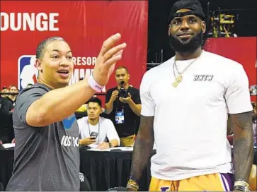  ?? NEW CLIPPERS Ethan Miller Getty I mages ?? coach Tyronn Lue has a good rapport with today’s NBA superstars such as LeBron James.