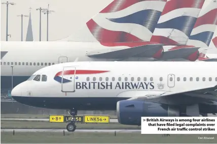  ?? Dan Kitwood ?? > British Airways is among four airlines that have filed legal complaints over French air traffic control strikes