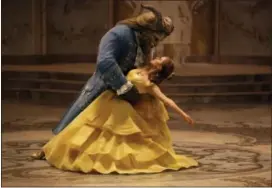 ?? DISNEY VIA AP ?? Dan Stevens as The Beast, left, and Emma Watson as Belle in a live-action adaptation of the animated classic “Beauty and the Beast.”