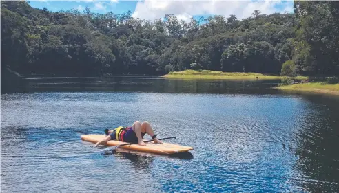  ?? Picture: DANIEL BATEMAN ?? BOARDING BLISS: Paddleboar­ding on the calm waters of Copperlode Dam can be a relaxing experience.