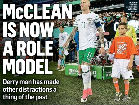  ??  ?? LEADER: McClean leads Ireland out in New Jersey