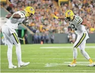  ?? ADAM WESLEY/USA TODAY NETWORK-WISCONSIN ?? Packers wide receivers Geronimo Allison (left) and Randall Cobb celebrate after Cobb’s touchdown against the Bears. Cobb is one of several Packers to miss time due to injuries this season.