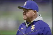  ?? FL — MATTHEW HINTON ?? LSU baseball head coach Paul Mainieri watches his players practice before a Feb. 14 game against Indiana, in Baton Rouge, La.