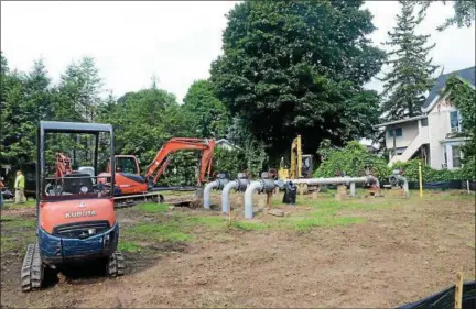  ?? TANIA BARRICKLO — DAILY FREEMAN ?? Work on the new natural gas regulator station at Washington Avenue and Janet Street in Kingston is shown on July 26.