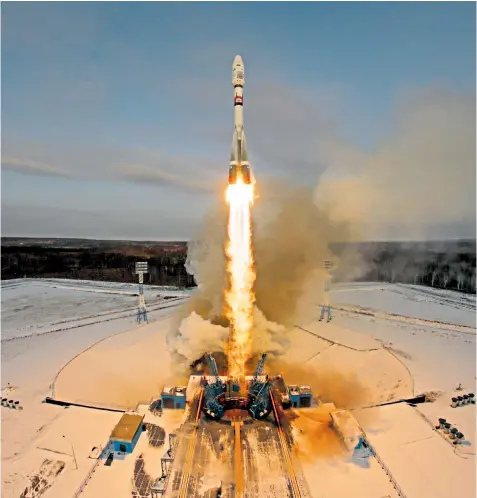  ??  ?? The Soyuz-2.1b rocket carrying the Meteor-m satellite and 18 smaller units lifts off yesterday from Russia’s new Vostochny Cosmodrome in the far east of the country