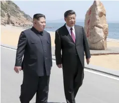  ??  ?? This photo released on May 8 by China’s Xinhua News Agency shows Kim Jong Un (left) meeting with Xi Jinping in Dalian. — AFP photo