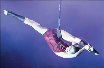  ?? Picture: John Ward ?? ACROBATIC: Zip Zap Circus’s Saskia van Rensburg performs a trapeze act. The circus and the Cape Town Symphonic Orchestra will dazzle with a special Women’s Month treat.