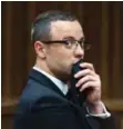  ?? — AP ?? PRETORIA: In this photograph taken on Tuesday, May 19, 2014, Oscar Pistorius listens to psychiatri­c evidence for his defense, during his ongoing murder trial in Pretoria, South Africa.