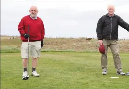 ??  ?? Greenkeepe­r Joe Mooney making sure the course at County Louth is in tip-top condition on the first day of reopening last week. Eugene Holland, Conor Long and Cyril Sullivan keep at least two metres apart during their round at Laytown and Bettystown.