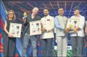  ?? PTI ?? Union I&B minister Anurag Thakur and Goa CM Pramod Sawant felicitate members of the internatio­nal jury at the opening ceremony of IFFI, in Goa on Sunday.