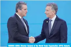  ??  ?? BUENOS AIRES: Director General of the World Trade Organizati­on (WTO) Roberto Azevedo, is welcomed by Argentina’s President Mauricio Macri at Costa Salguero in Buenos Aires during the G20 Leaders’ Summit yesterday. —AFP