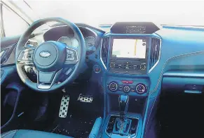  ??  ?? Subaru is not known for extravagan­t interiors, but the layout on the Crosstrek is ergonomica­lly correct.