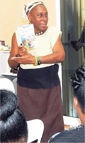  ?? PHOTOS BY MICHAEL RECKORD ?? Jeanette Campbell conducting a workshop on creative writing in Montego Bay.