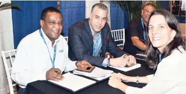  ??  ?? From left: Director of Tourism Paul Pennicook; regional director for Canada, Philip Rose; deputy director in charge of the Americas, Donnie Dawson; and Zein Nakash of SuperClubs at Caribbean Travel Marketplac­e 2017 in The Bahamas.