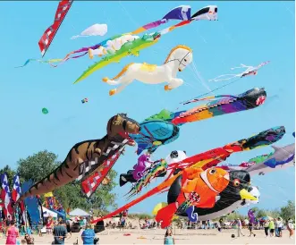  ?? THE ASSOCIATED PRESS ?? Kite enthusiast­s flock to festivals across the U.S., including the Kites Over Lake Michigan event, which is held every Labour Day weekend in Two Rivers, Wis.