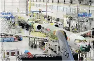  ?? NATHAN DENETTE / THE CANADIAN PRESS ?? The government­s of Canada and Quebec must have known that subsidizin­g Bombardier would trigger retaliatio­n from the firm’s rivals, Andrew Coyne writes.