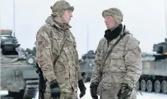  ??  ?? > Fusilier Lee Hilmer-Hills, left, and his brother Lance Corporal Alex Hilmer-Hills, from Pembrokesh­ire