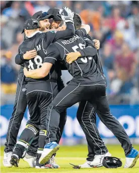  ?? Photo / Photosport ?? Kane Williamson, Tom Latham, Jimmy Neesham and the Black Caps celebrate the final-over victory against the West Indies.