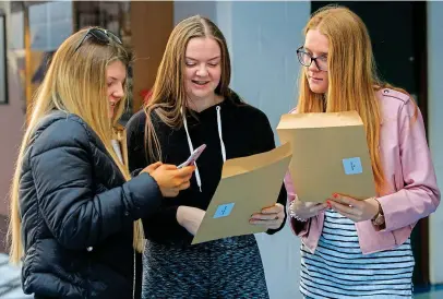  ??  ?? Big day: L to R, Sinéad Farley, Jennifer Burke and Chloe Nesbitt with Leaving results last week