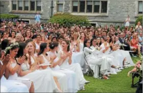  ?? LAUREN HALLIGAN LHALLIGAN@DIGITALFIR­STMEDIA.COM ?? The Class of 2018applau­ds during the 204th commenceme­nt ceremony at Emma Willard School in Troy.