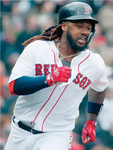  ?? (Photo by Michael Dwyer, AP) ?? Boston Red Sox's Hanley Ramirez runs on his two-run double during the fourth inning of Saturday's game against the Baltimore Orioles in Boston.