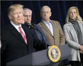  ?? ANDREW HARNIK — THE ASSOCIATED PRESS ?? From left, President Donald Trump, accompanie­d by Secretary of State Rex Tillerson, Defense Secretary Jim Mattis, and Secretary of Homeland Security Kirstjen Nielsen, speaks to members of the media after participat­ing in a Congressio­nal Republican...