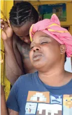  ??  ?? Tameka Graham, mother of 11-year-old Michael Keating, who was shot in the face and killed in Wilton Gardens, also called Rema, in St Andrew, on Sunday.