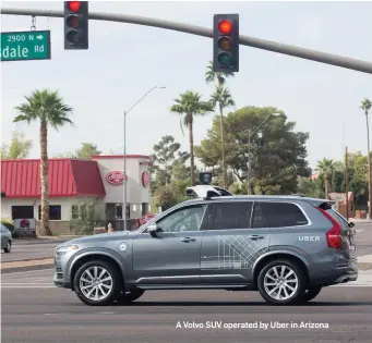  ??  ?? A Volvo SUV operated by Uber in Arizona