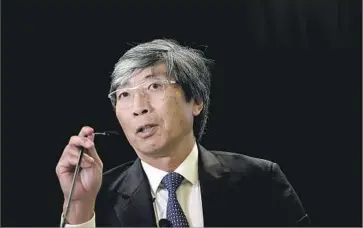  ?? Darren McColleste­r Getty Images for NantHealth ?? NANTHEALTH is led by Dr. Patrick Soon-Shiong. The Culver City company will cut 300 employees and sell its provider and patient engagement assets to Chicago-based healthcare IT firm Allscripts.