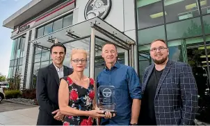  ??  ?? Holden New Zealand managing director Marc Ebolo, New Zealand Motoring Writers Guild member Jacqui Madelin, Greg Murphy and guild president Richard Edwards at the presentati­on of the Neil Nelson award.