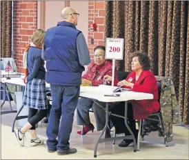  ?? [DOUG HOKE/THE OKLAHOMAN] ?? Voters cast their ballots in Oklahoma City election at Crown Heights Christian Church on Tuesday.