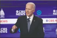  ?? The Associated Press ?? PRIMARY DEBATE: In this Feb. 25 file photo, Democratic presidenti­al candidate former Vice President Joe Biden, speaks during a Democratic presidenti­al primary debate at the Gaillard Center in Charleston, S.C., co-hosted by CBS News and the Congressio­nal Black Caucus Institute. The Congressio­nal Black Caucus PAC is endorsing Joe Biden’s presidenti­al bid, further cementing his support among the nation’s influentia­l black political leadership. Black voters have long anchored the former vice president’s White House bid with decisive wins in South Carolina and on Super Tuesday. The chairman of the Congressio­nal Black Caucus political action committee is New York congressma­n Gregory Meeks, who tells The Associated Press there’s “no question” Biden is the right person to lead the country.