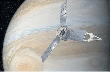  ??  ?? Nasa’s Juno spacecraft above Jupiter’s Great Red Spot in an illustrati­on obtained by Reuters on Tuesday.