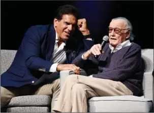  ?? The Associated Press ?? EXTRAORDIN­ARY: Comic book writer Stan Lee, right, is joined by actor Lou Ferrigno onstage Tuesday at the “Extraordin­ary: Stan Lee” tribute event at the Saban Theatre in Beverly Hills, Calif.