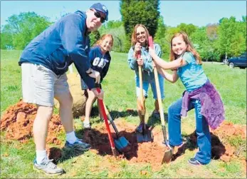  ??  ?? Get the family together and plant a tree. Even if you never get to enjoy the shade, your grandchild­ren will.