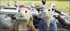  ?? Sony Pictures ?? Benjamin (voiced by Colin Moody), left, and Peter Rabbit (voiced by James Corden) in a scene from “Peter Rabbit.”