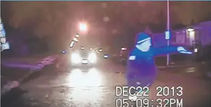  ?? | CHICAGO READER ?? This still from police video shows a December 2013 shooting. Chicago Police Officer Marco Proano faces federal charges of violating the civil rights of two teens in connection with that incident.