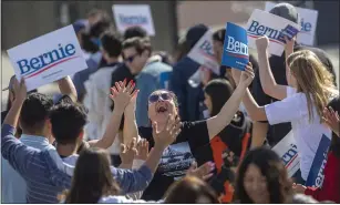  ??  ?? Sanders supporters arrive at his “Get Out the Early Vote” rally in Santa Ana.