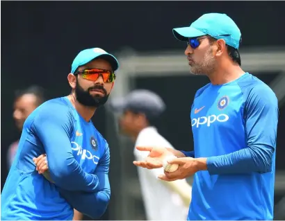  ?? AFP ?? The camaraderi­e between Virat Kohli (left) and MS Dhoni is heartening, says Committee of Administra­tors chief Vinod Rai. —