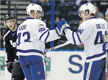  ?? GETTY IMAGES ?? Nazem Kadri, left, and Morgan Rielly of the Maple Leafs will be focused on earning a playoff spot rather than revenge when they host the Bruins on Monday night. Kadri is one of five players remaining from the Leafs team that lost a Game 7 heartbreak­er...