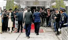  ?? — AFP photo ?? Newly-elected lawmakers arrive before the start of the electoral process to appoint Pakistan’s next prime minister at the Parliament House in Islamabad.