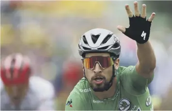  ?? PICTURE: PETER DEJONG/AP ?? Peter Sagan raises his hand as he crosses the line to win in Valence.