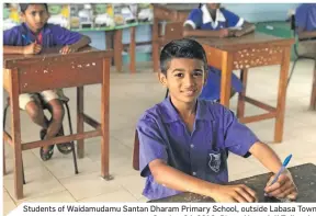  ?? Photo: Nacanieli Tuilevuka ?? Students of Waidamudam­u Santan Dharam Primary School, outside Labasa Town on October 04, 2018.