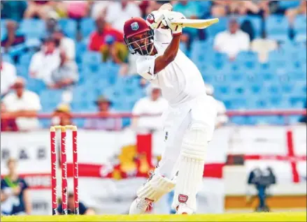  ?? RANDY BROOKS/AFP ?? Roston Chase of West Indies hits four during day four of the third and final Test between the West Indies and England at Darren Sammy Cricket Ground, Gros Islet, Saint Lucia, on Tuesday.