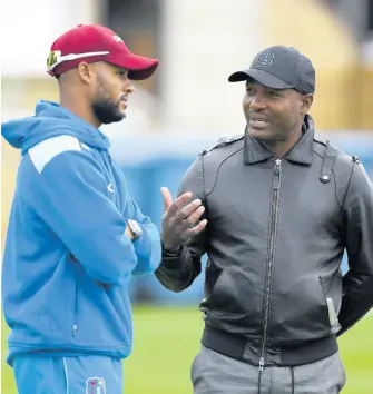  ?? CWI MEDIA ?? Windies legend Brian Lara (right) in discussion with Windies batsman Shai Hope during a nets session at Lord’s Cricket Ground on September 6, 2017 in London, England.