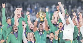  ?? Picture: FILE ?? Siya Kolisi hoists the Webb Ellis Cup as the South Africa 15s players celebrate after the 2019 RWC.